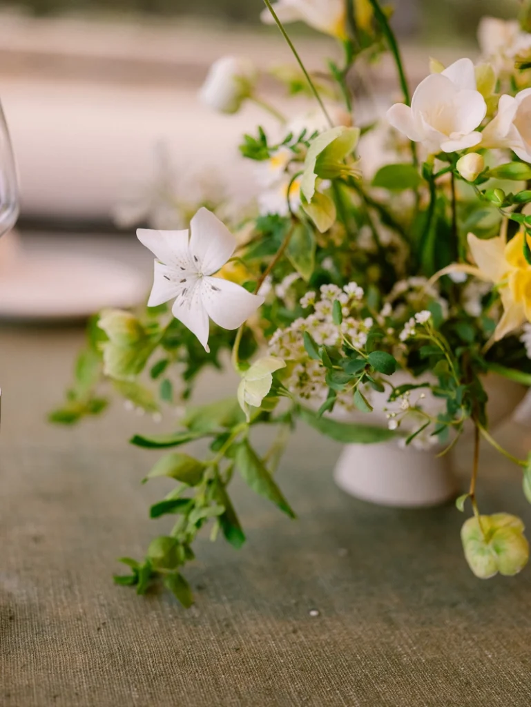 delicate floral centerpiece arrangement - valley girls napa
