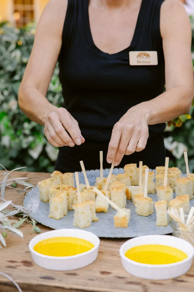 focaccia bread appetizers with olive oil dipping bowls.